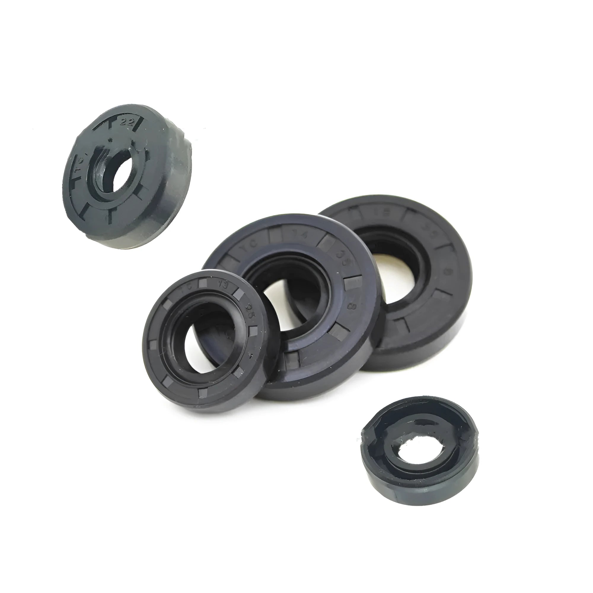 AG100 motorcycle rubber oil seal kit showing multiple black seals with carbon steel cores in various thicknesses