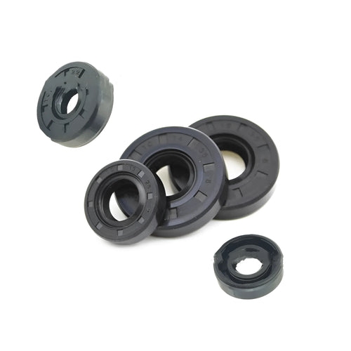 AG100 motorcycle rubber oil seal kit showing multiple black seals with carbon steel cores in various thicknesses