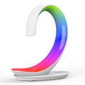 White swan-shaped desktop wireless charger with Bluetooth speaker and colourful LED atmosphere lighting