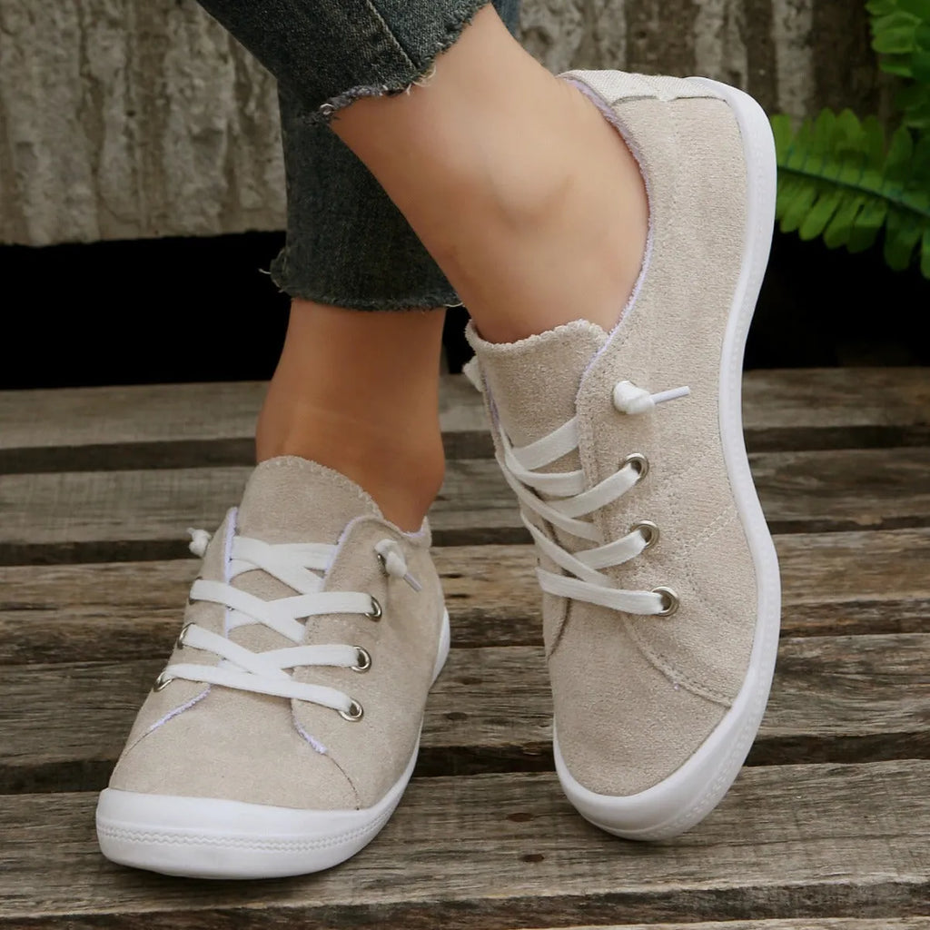 Women's creamy white fabric low-top casual sneakers with rubber sole
