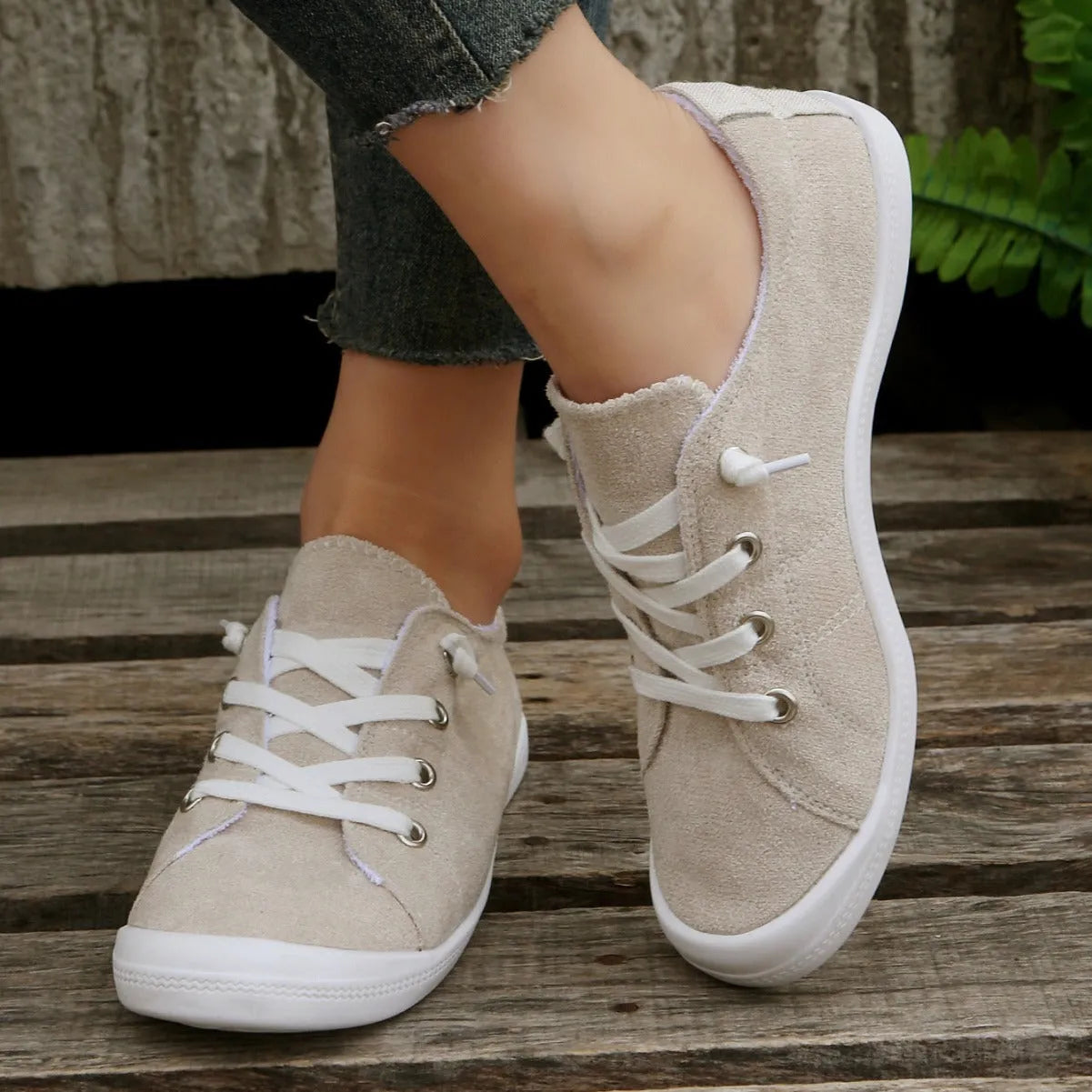 Women's creamy white fabric low-top casual sneakers with rubber sole
