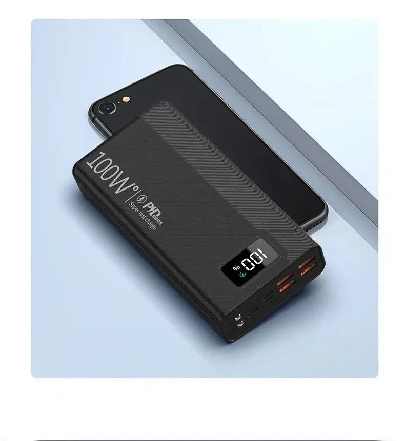 Large black and white plastic power bank showing front view with capacity options from 20000mAh to 50000mAh.