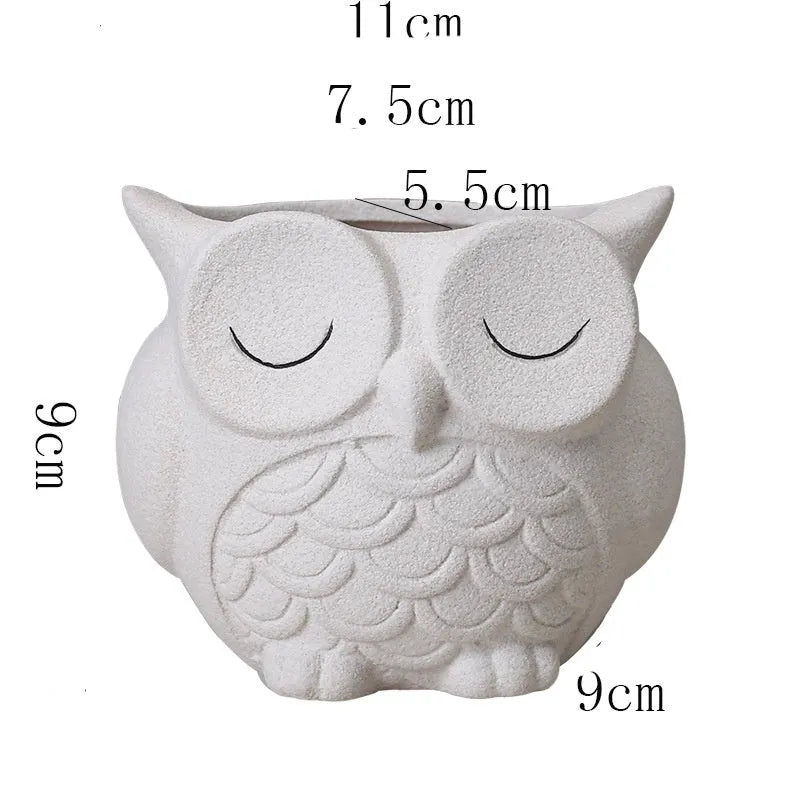 Handmade frosted ceramic flower pot with a cartoon owl design for small succulents.