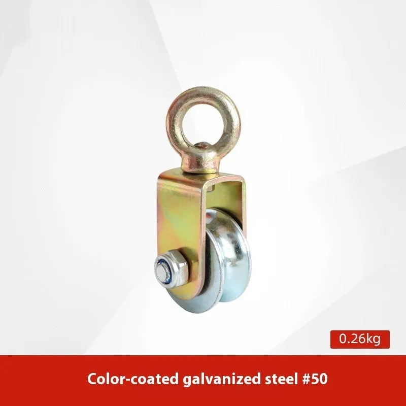 Red industrial steel lifting pulley with a safety latch on the hook.