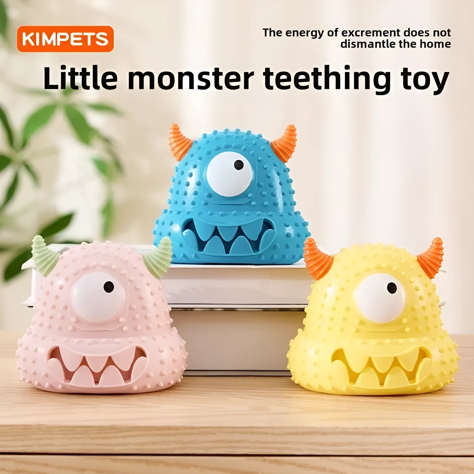 Little monster vocal dog toy in blue with exaggerated eyes, horns, and teeth; made of bite-resistant silicone.