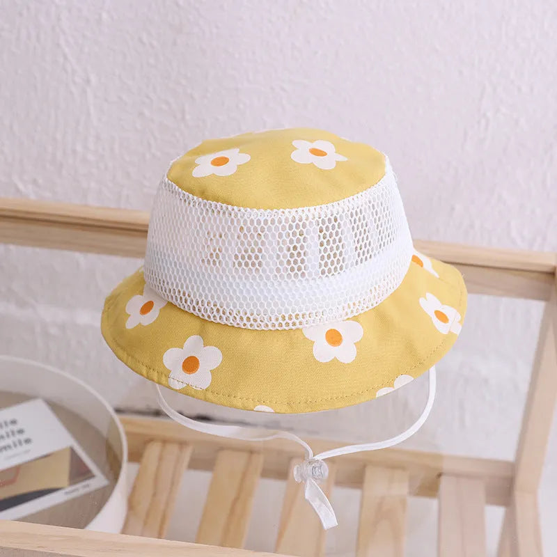 Floral baby bucket hat in blue with mesh fabric, side view showing brim and weft-knitted texture