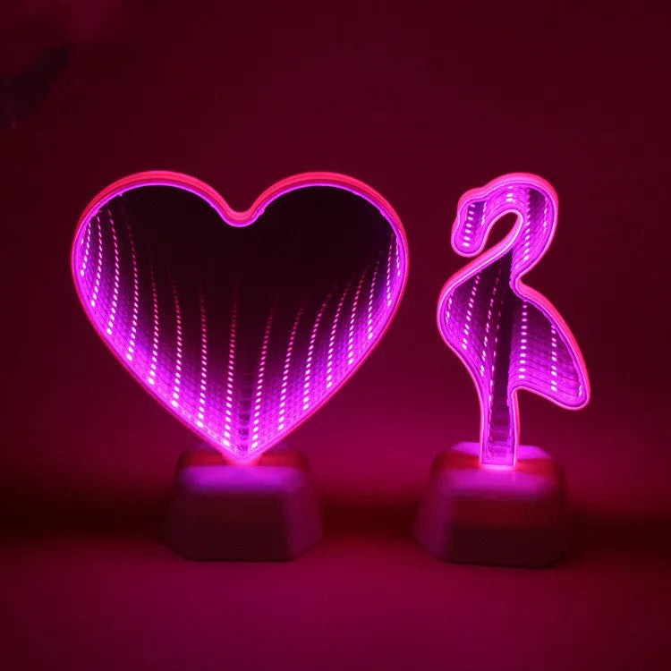 Rose red LED double-sided love tunnel light on a tabletop showing its plastic construction and dimensions.