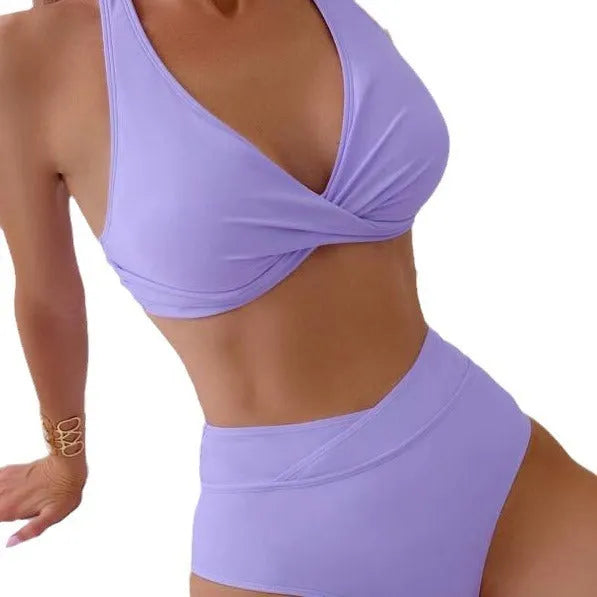 Women's high-waisted one-piece swimsuit in nylon, shown in one of five colours: black, blue, green, lavender, or peacock green.