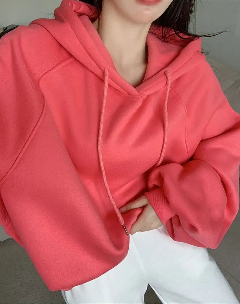 Women's loose hooded sweater in watermelon red made from mulberry silk fabric showing front view