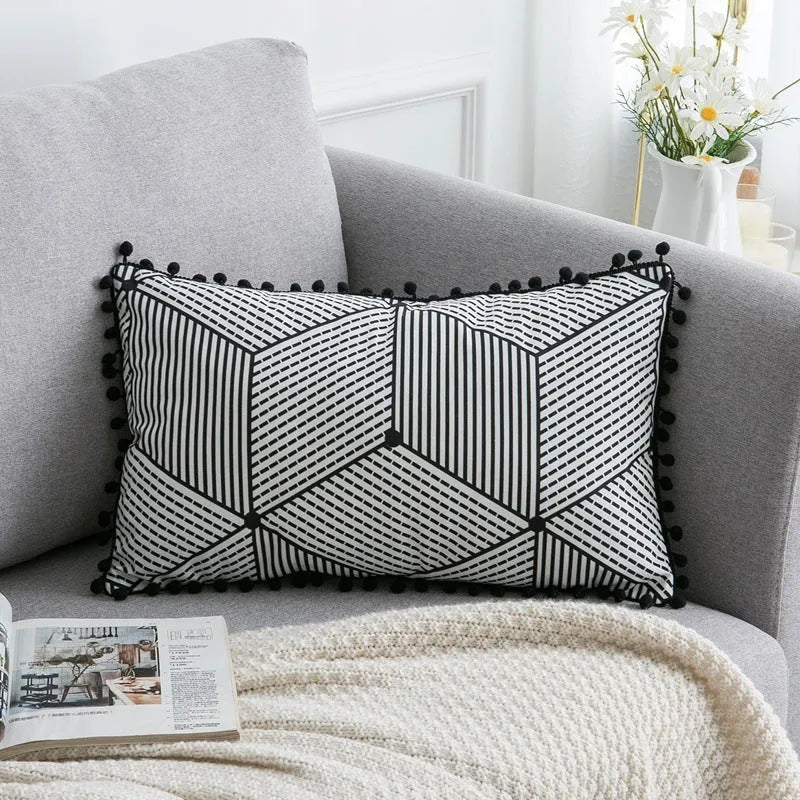 Bohemian style throw pillow on a sofa, available in light grey, black, or white, shown in 45x45cm size.