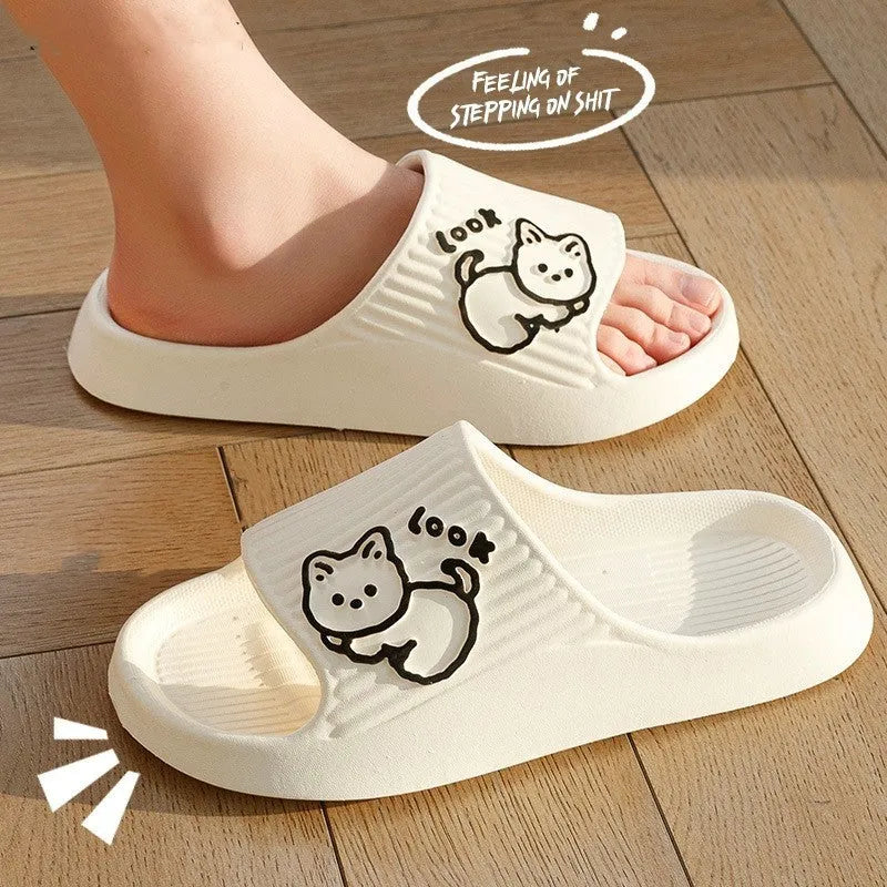 Women's pink cat-themed flip-flop slippers with a thick light blue EVA platform sole.