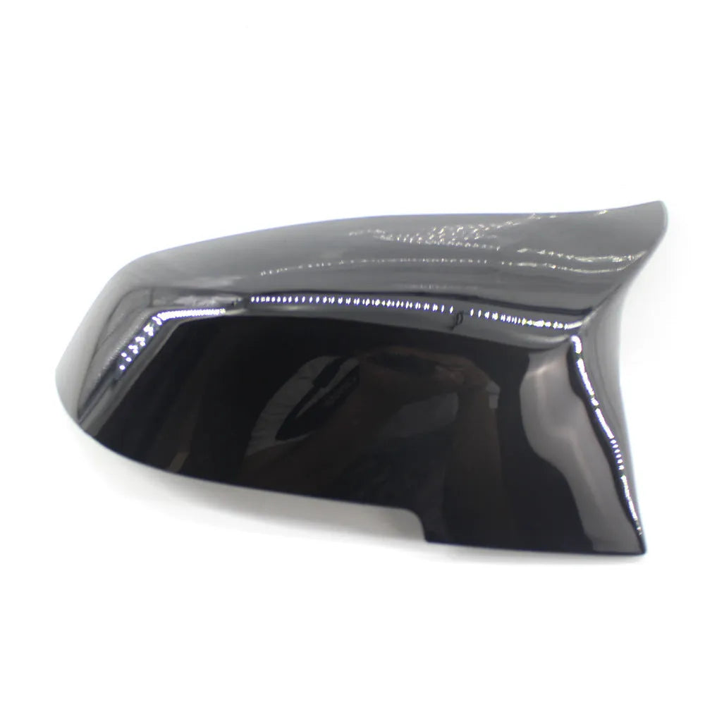 Paint bright black replacement rear-view mirror shell for BMW 3 Series and 4 Series F-model vehicles.
