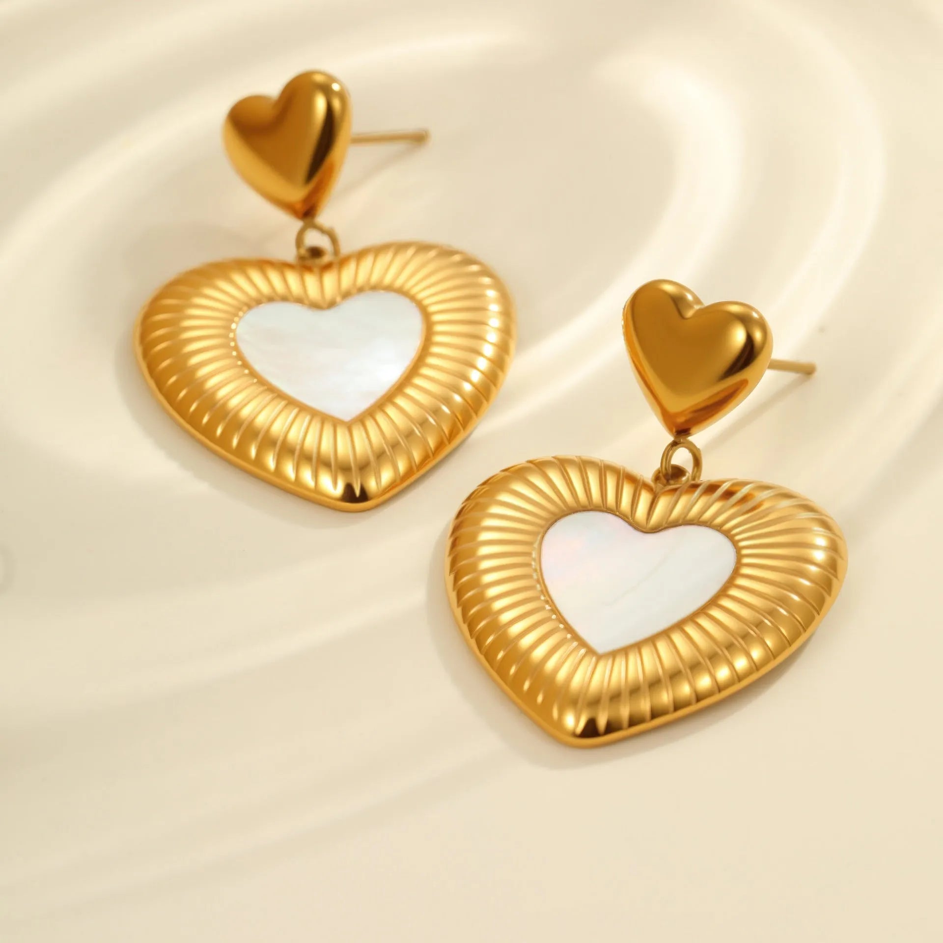 Gold-colour heart-shaped stainless steel earrings for women with electroplated finish