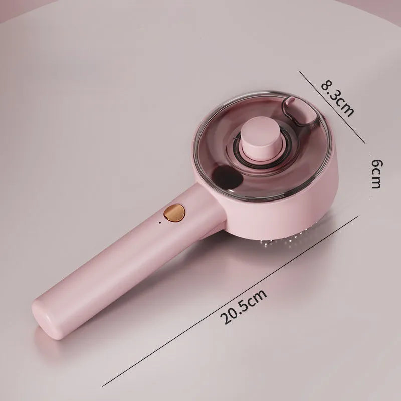 Pink and white cat steam brush with transparent water tank and rounded comb head