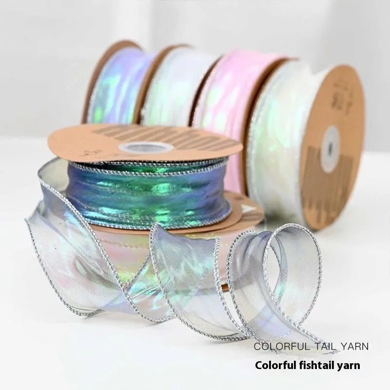 Fishtail yarn ribbon mesh with colourful wave pattern measuring 4cm wide for gift wrapping and decoration