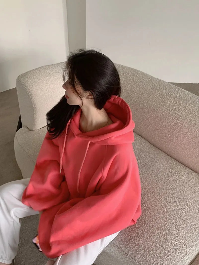 Women's loose hooded sweater in watermelon red made from mulberry silk fabric showing front view