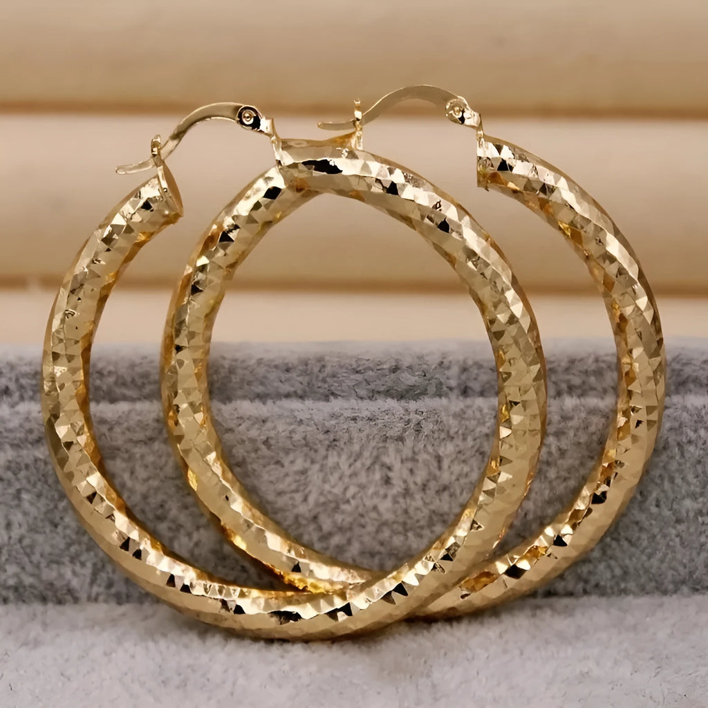 Gold retro alloy earrings for women with classic simple design in European American style
