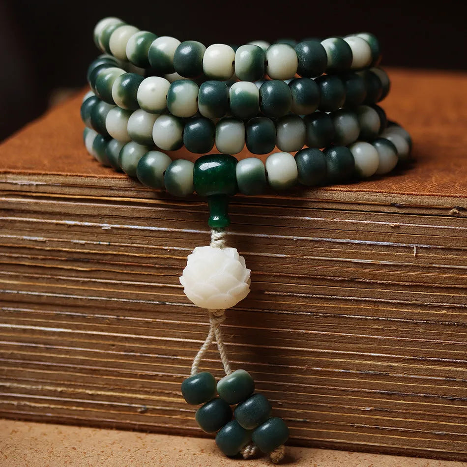 Lotus White Jade Bodhi root bracelet with floating flowers pattern on 8 × 10mm beads