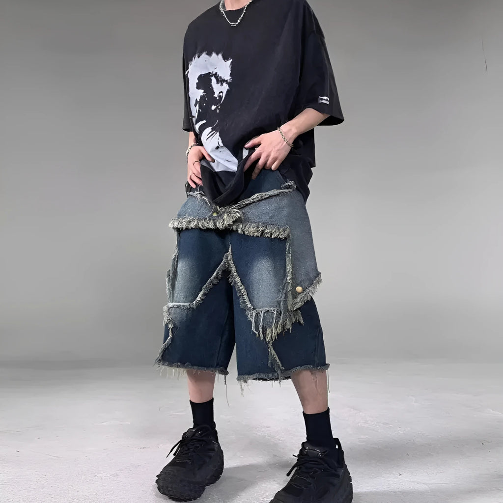 Blue denim shorts with frayed five-pointed star design and loose fit