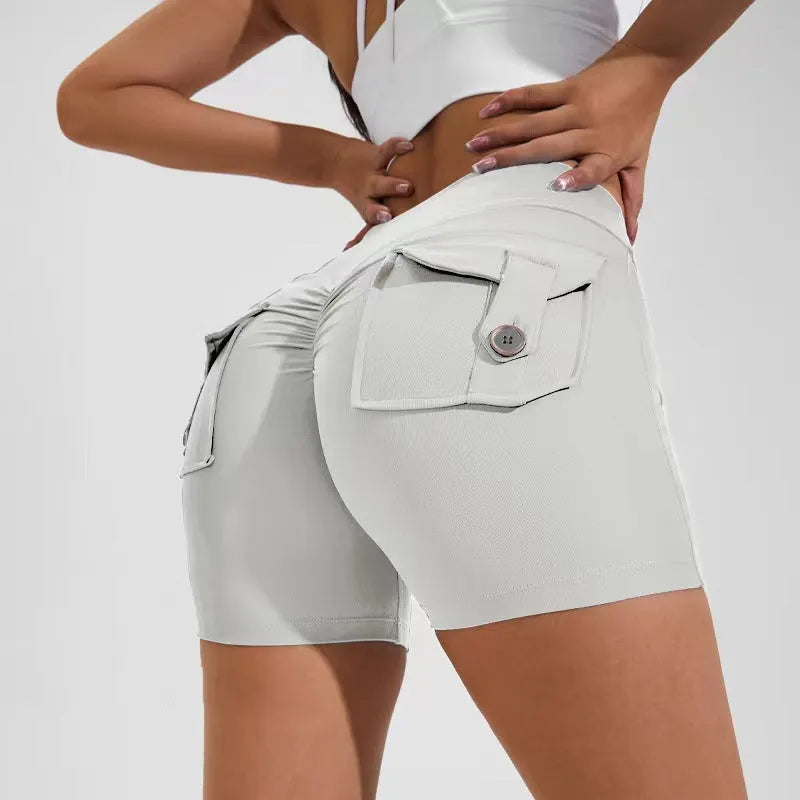 Women's high waist hip lifting shorts with side pockets in quick-dry nylon fabric