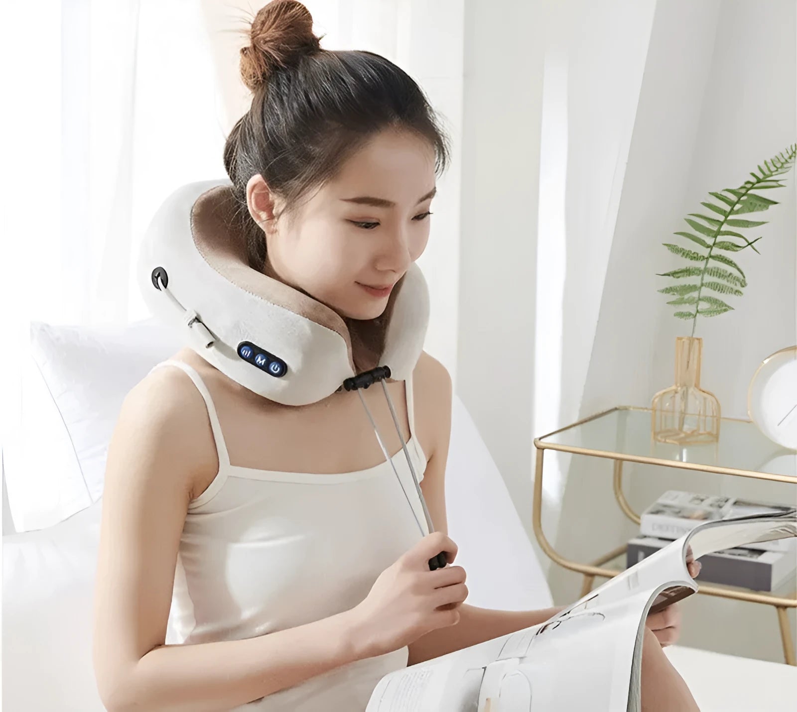 Brown U-shaped electric neck massage pillow with control buttons