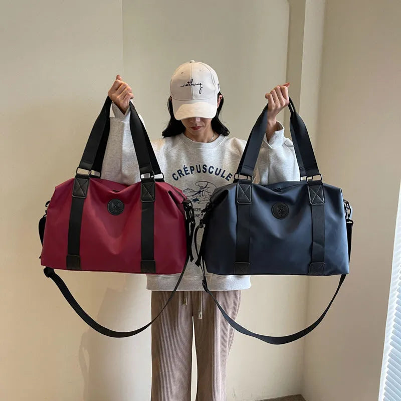 Large waterproof Oxford cloth travel bag in black colour with 36-55L capacity for short-distance leisure travel