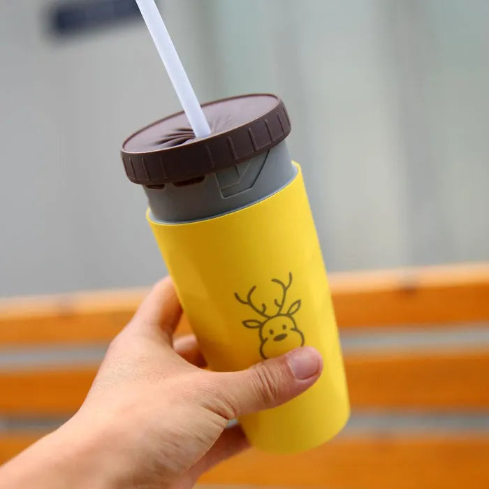 300ml green twist top lidless double wall travel cup with straw on blue background