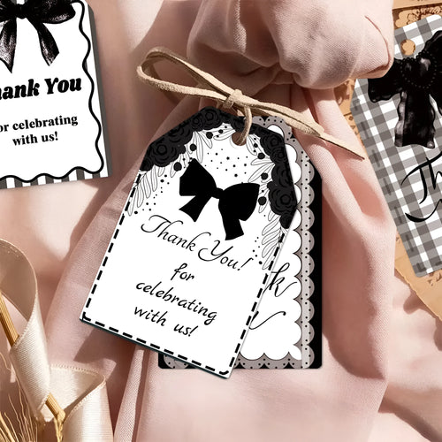 Set of 60 decorative bowknot-shaped paper gift tags with natural jute twine for birthdays.
