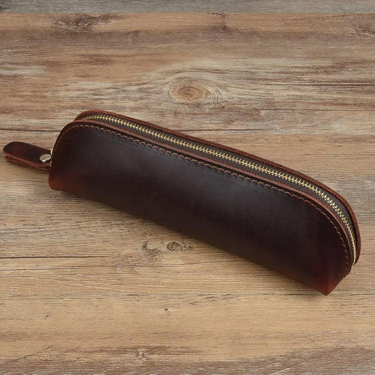 Handmade cowhide leather pencil case in rectangular shape with zipper closure