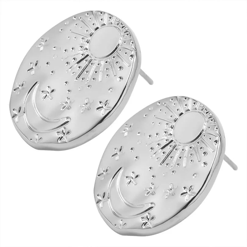 A pair of geometric shell design stud earrings in stainless steel, shown in gold and silver colour options.