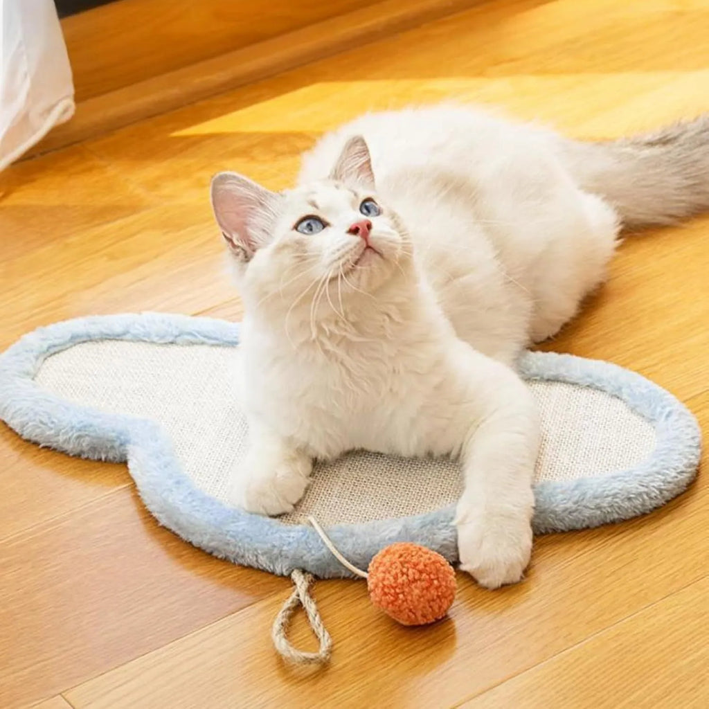White wall mounted cat scratching mat with cartoon cat design made from natural sisal fabric
