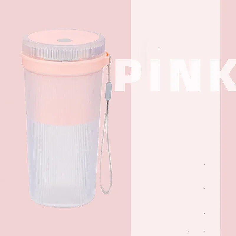 Portable electric blender cup in blue, green, or pink with USB charging cable.