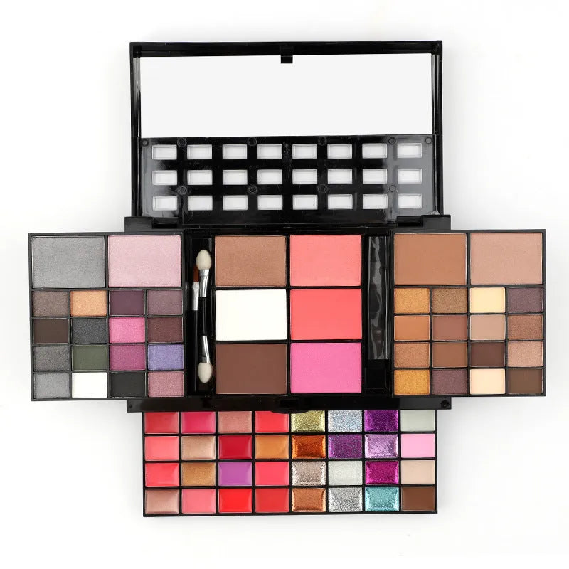 74 colour makeup palette with four layers showing eyeshadows, lip glosses, blush and contour powders with brush set