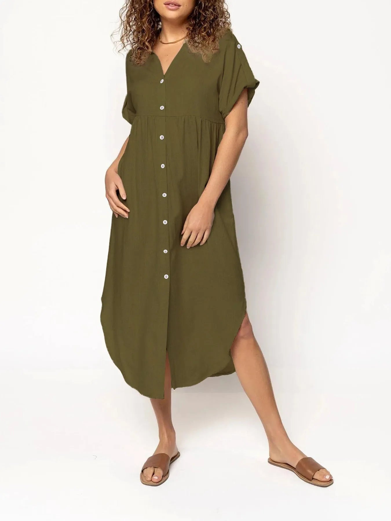 Loose-fitting casual solid colour button dress in a mid-length style on a hanger.