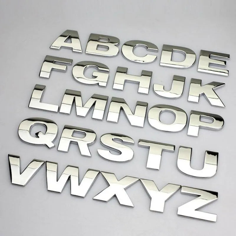 Zinc alloy metal car bumper sticker showing raised 3D letter design in approximately 2.5cm size