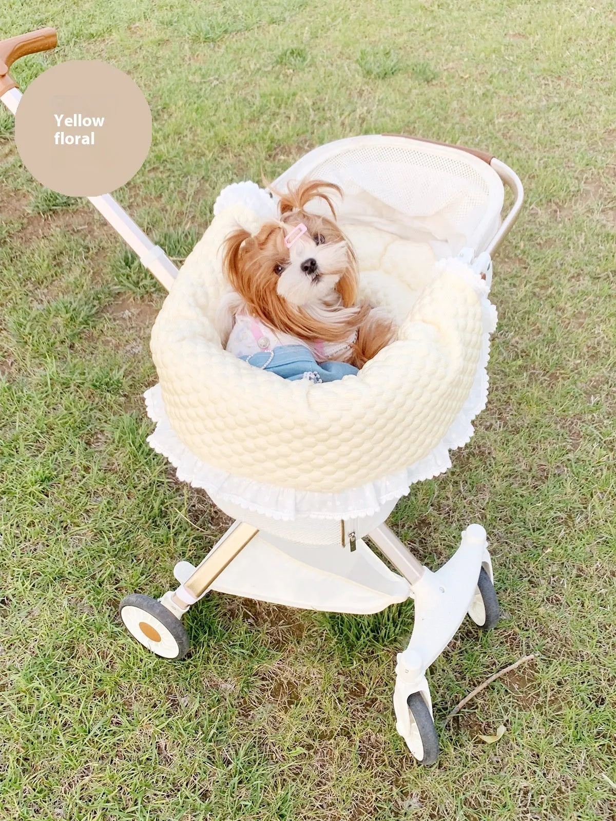 Pet stroller three-piece set showing removable towel, cushion and pillow in floral pattern