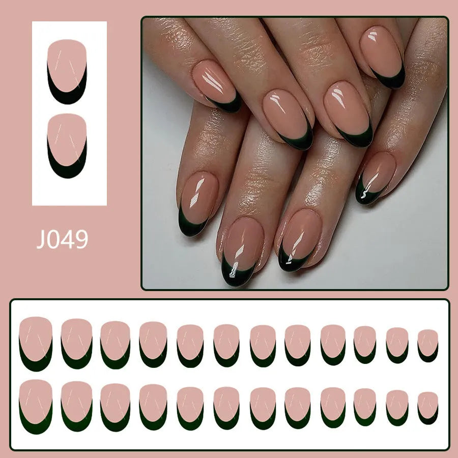 Set of 24 simple black French style false nails with a short almond shape on a clean background.