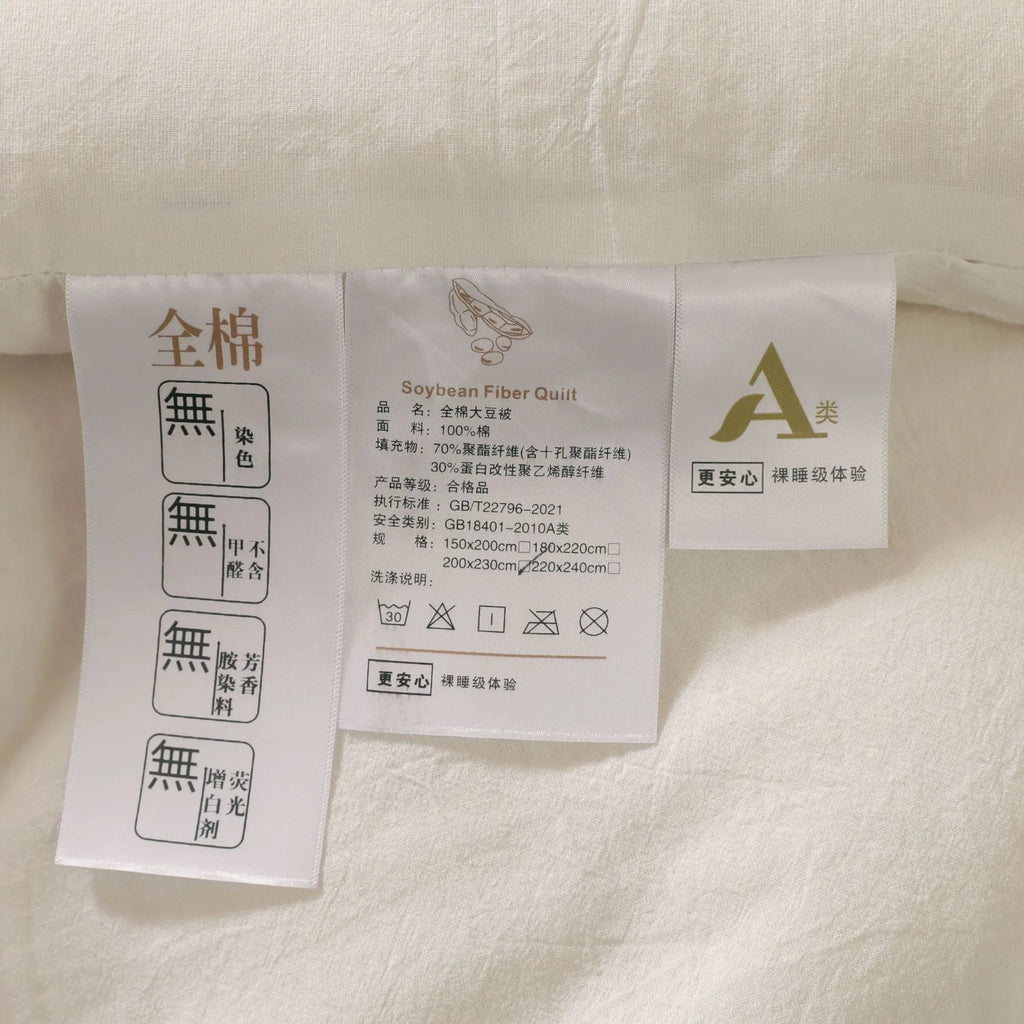 Soybean fibre and pure cotton quilt in white, grey or pink jade, showing twill weave texture.