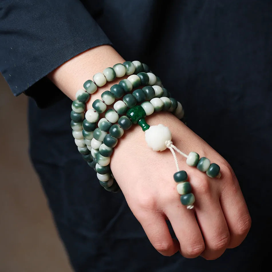 Lotus White Jade Bodhi root bracelet with floating flowers pattern on 8 × 10mm beads