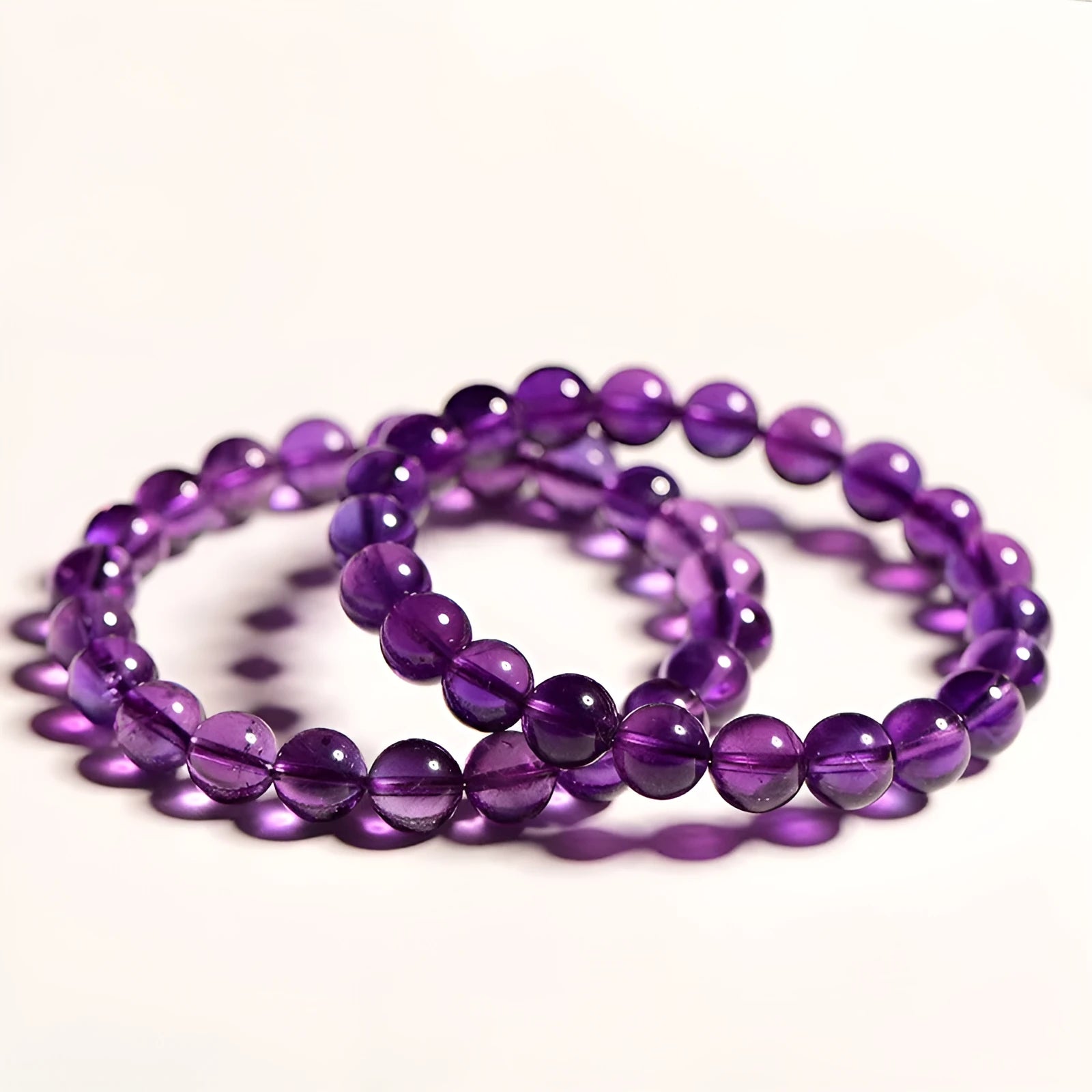 Natural Uruguayan amethyst bracelet with scattered polished beads in multiple size options