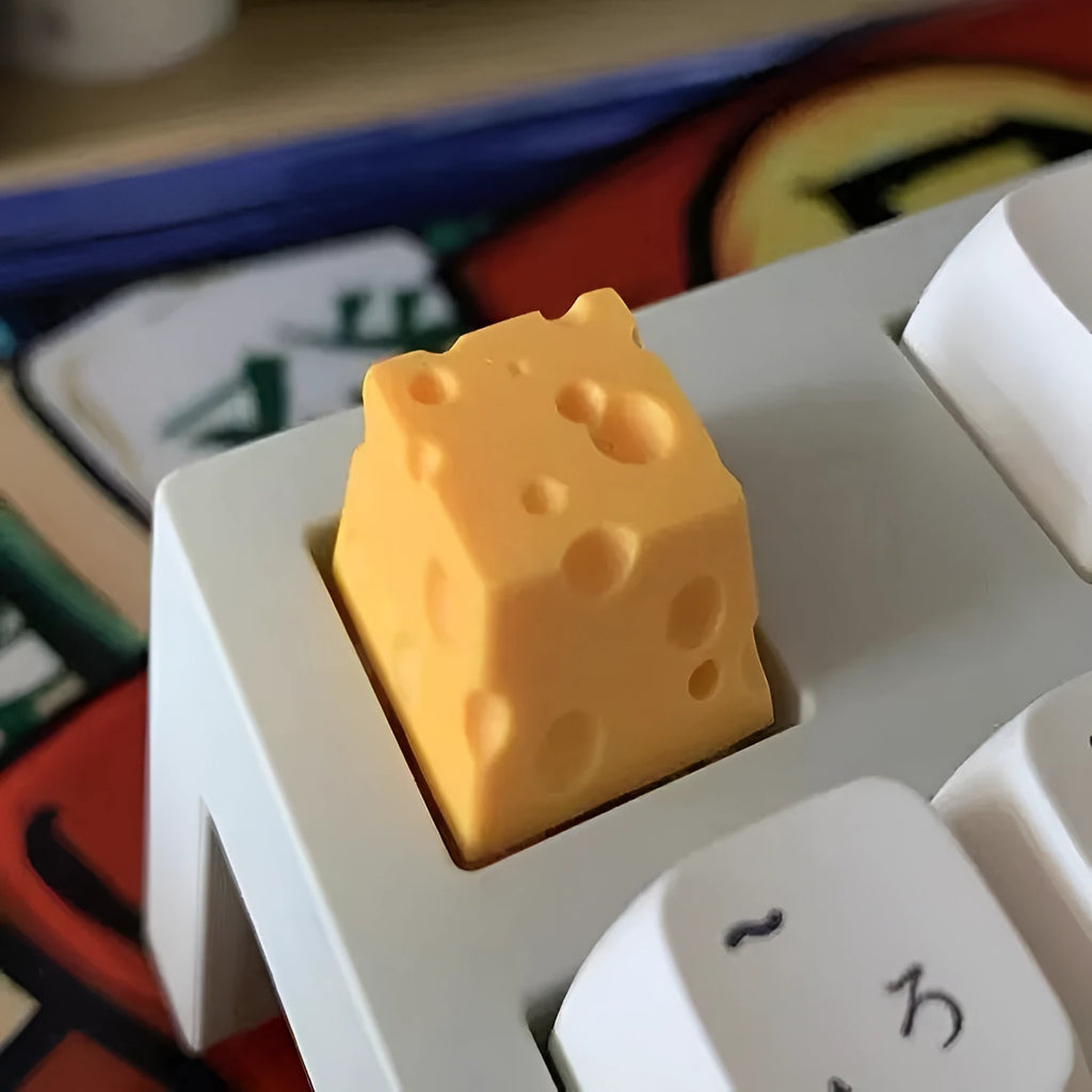 Yellow resin cheese wedge key cap for mechanical keyboards with detailed sculpting
