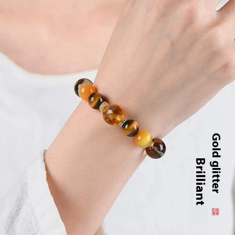 Women's natural yellow 10mm artificial crystal bead bracelet on wrist
