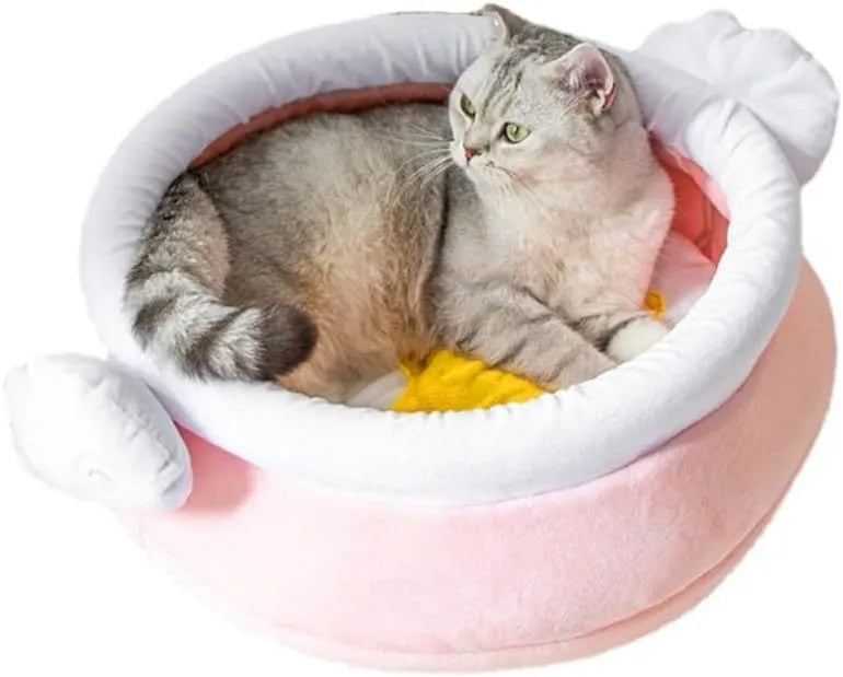 Pink honey pot-shaped cat bed with magic wand design and a soft, removable inner cushion.