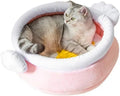 Pink honey pot-shaped cat bed with magic wand design and a soft, removable inner cushion.