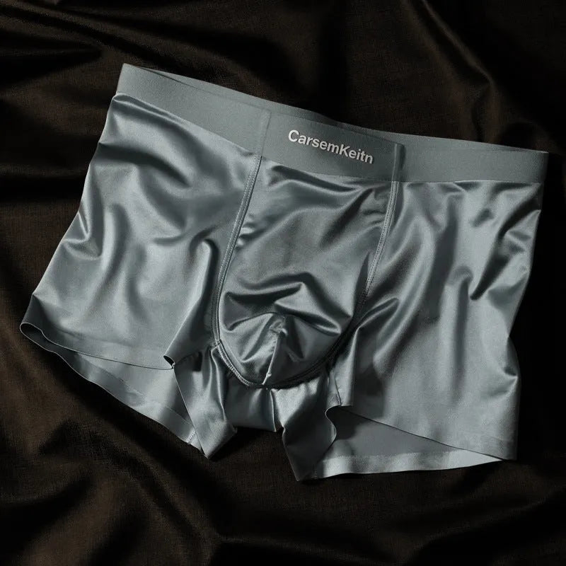 Men's colourblock Ice Silk seamless underwear in blue, brown, gray, and white colours.