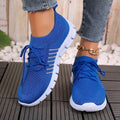 Women's breathable mesh flat shoes in various colours with front tie and round toe.