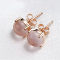 Rose gold drop-shaped stud earrings with synthetic quartz crystal inlay in Korean minimalist style
