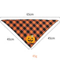 Orange and white Halloween dog plaid bandana with pumpkin and skeleton appliqués