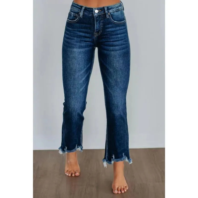Women's solid colour denim jeans in dark blue or light blue, made from cotton fabric.