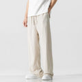 Men's cropped linen trousers in bamboo fibre with a loose straight-leg fit and drawstring waist.